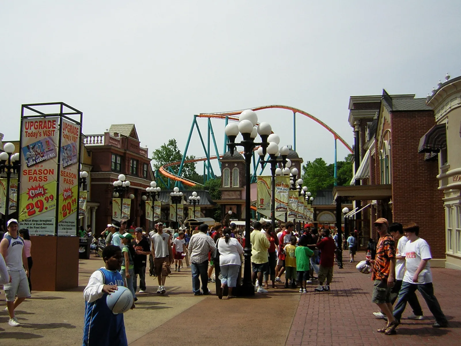 Main entrance street of Six Flags Over Georgia with the Goliath roller coaster behind