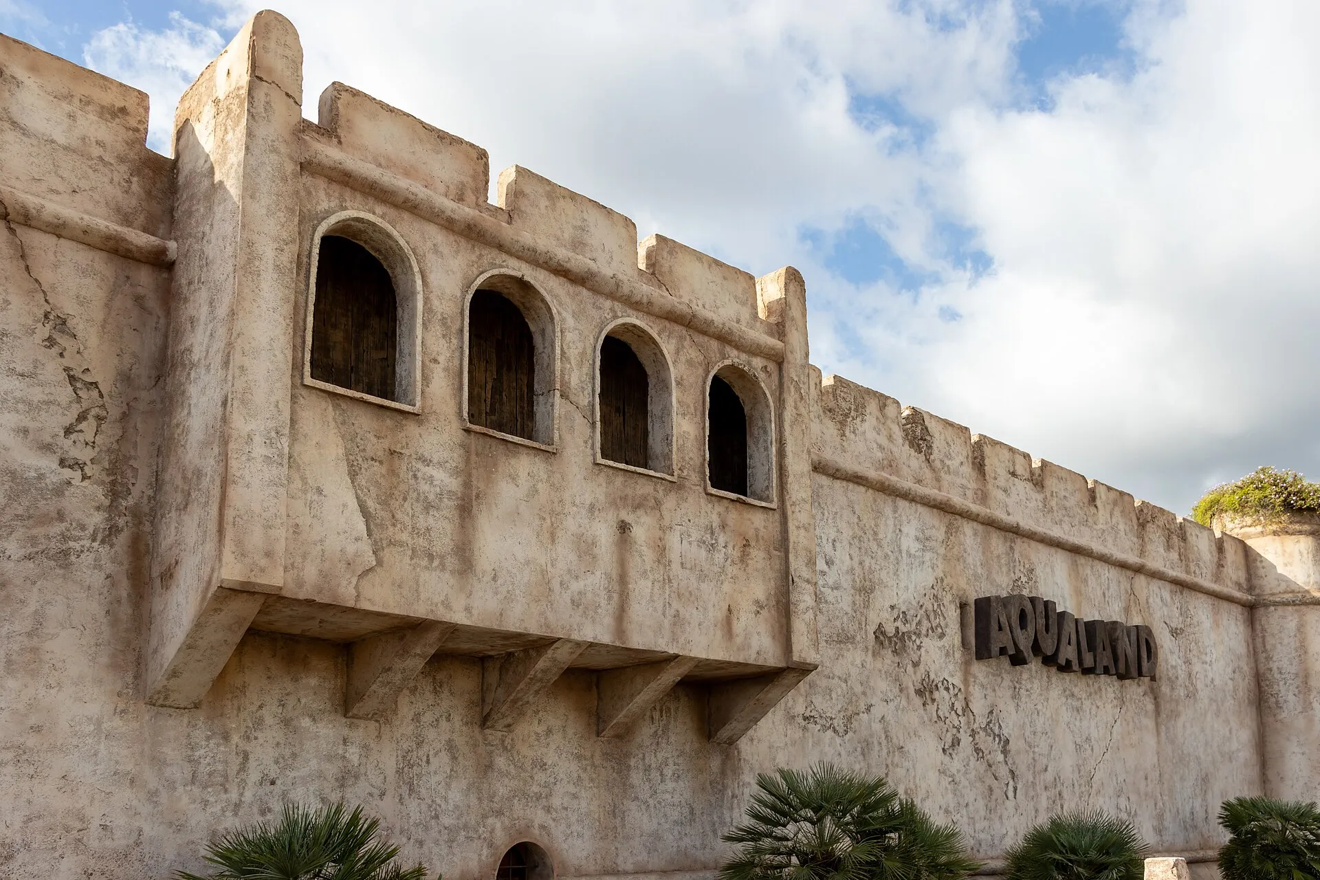 Fortress-style entrance wall of Aqualand Costa Adeje water park in Tenerife