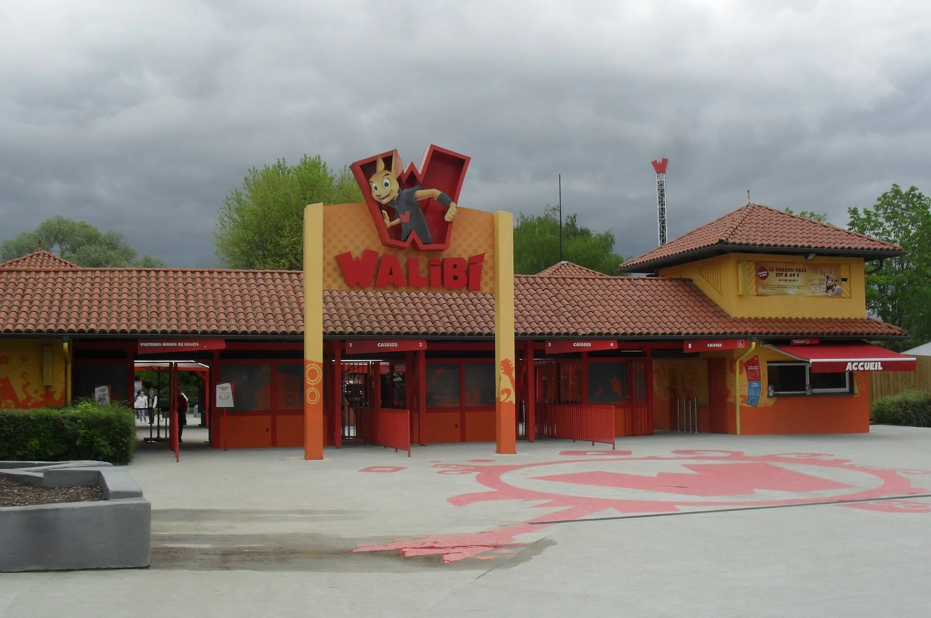 Main entrance of Walibi Rhône-Alpes theme park with the red Walibi kangaroo logo above the ticket gates