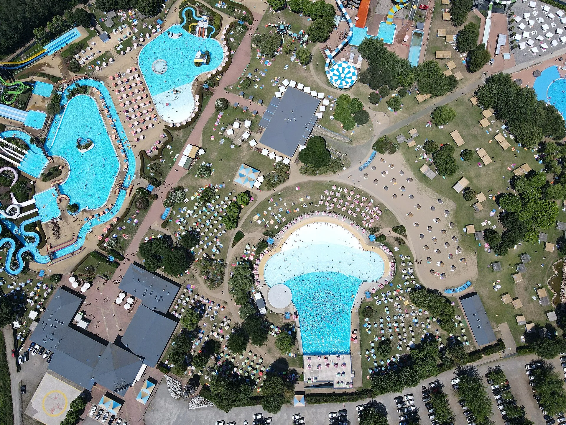 Aerial view of Ondaland water park in Vicolungo with wave pool, lagoon and slides