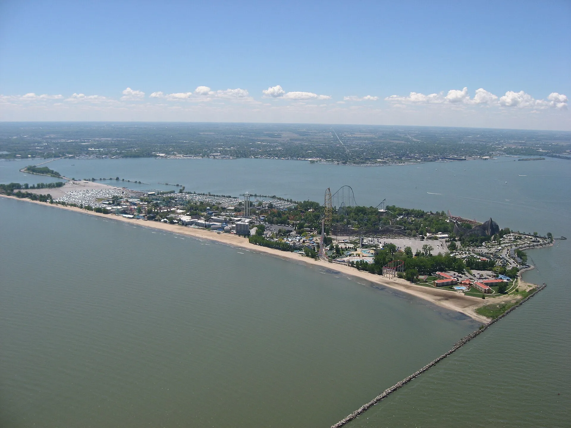 Aerial view of the Cedar Point peninsula and its roller coasters on Lake Erie