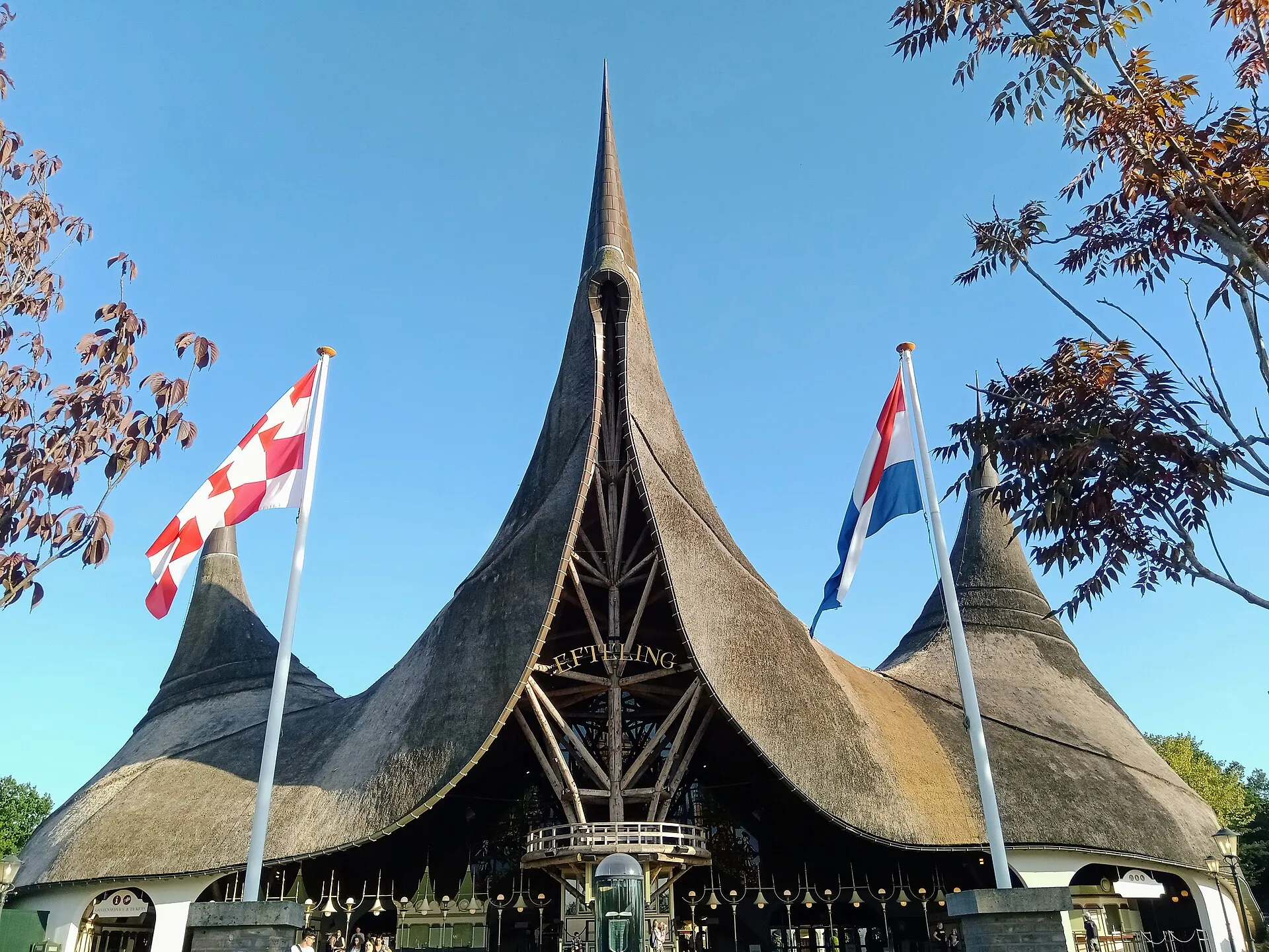 Pointed thatched spires of the House of the Five Senses, the main entrance of Efteling